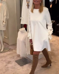 Nia – Elegant Bow-Sleeve Mini Dress