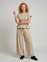 Eirenne | Peplum Detail Smocked Top And Wide Leg Pants Set