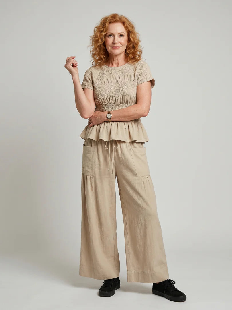 Eirenne | Peplum Detail Smocked Top And Wide Leg Pants Set